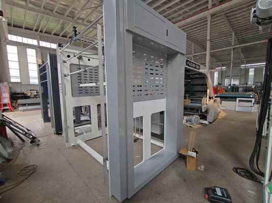 HL1600 Automatic Flute Laminating Machine with 1600X1250mm Max. Laminating Size, 5500 sheets/hour Speed, and PLC Program Control
